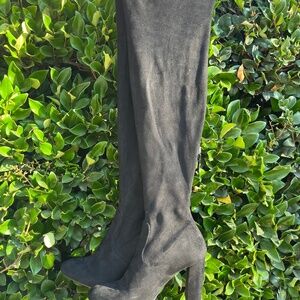 Black over the knee boots.
